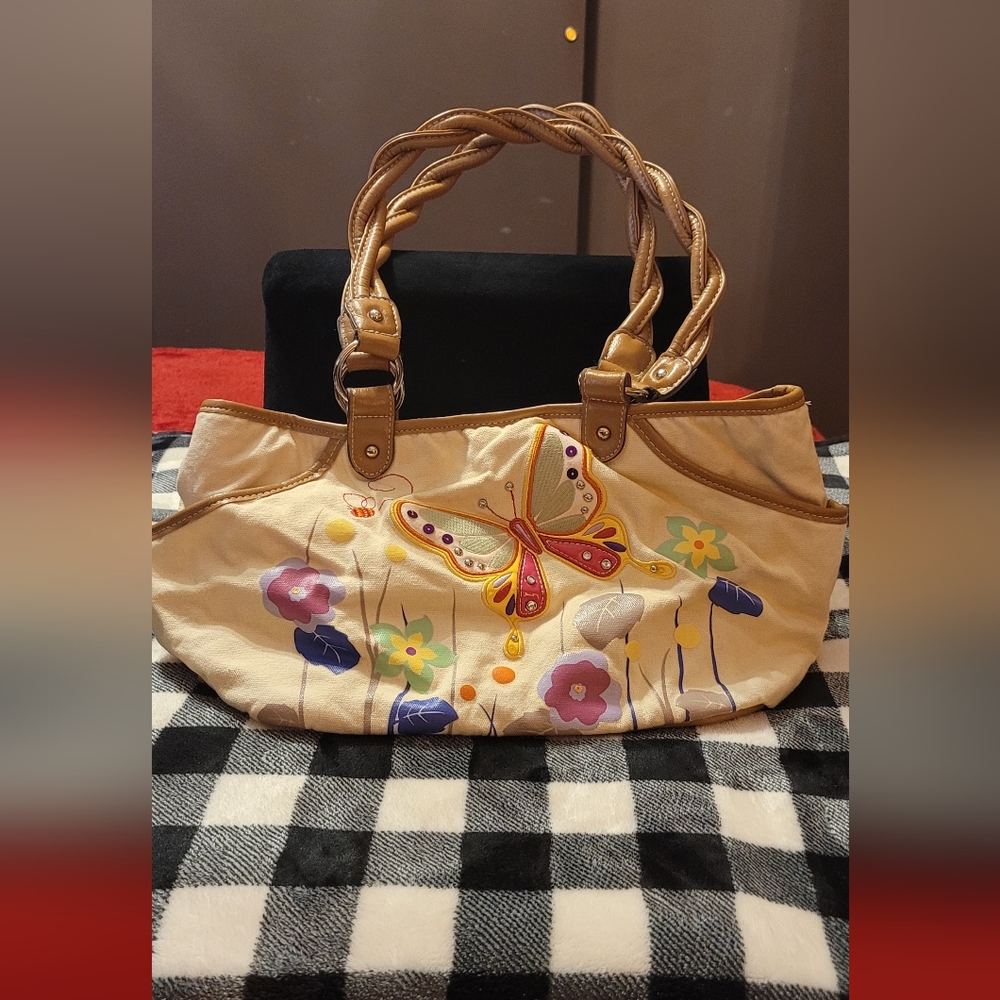 SOLD  rosetti hangbag